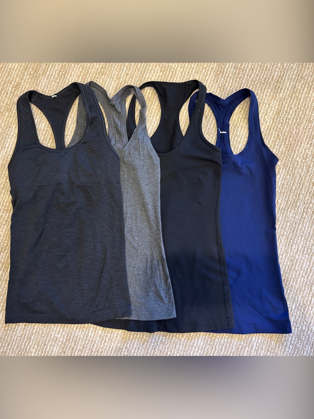 Four Lululemon Racer Back Tops, size 2 & 4